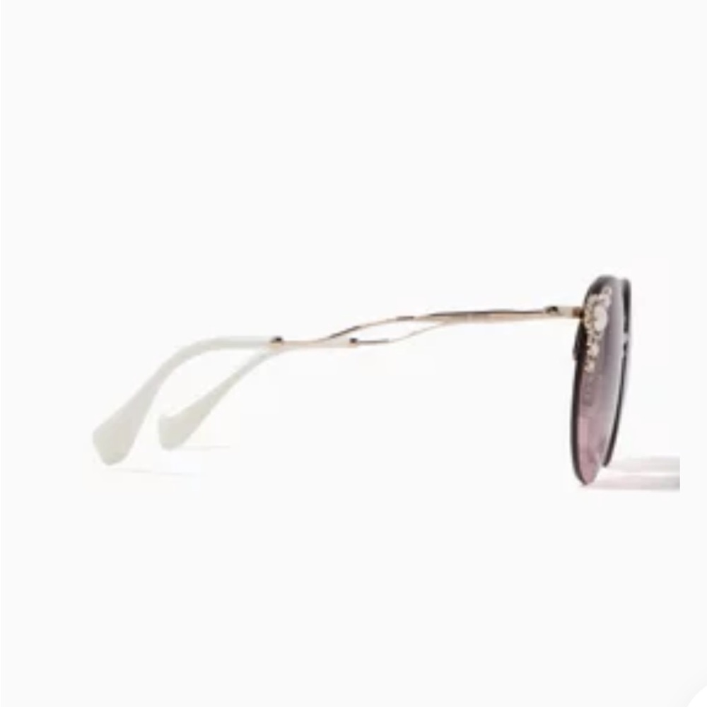 Elegant Miu Miu's Manière Sunglasses with pearl
Embellishments - Picture 10 of 10